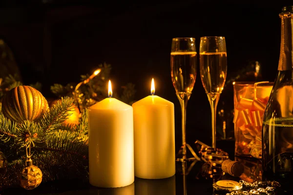 Lit Candles with Festive Glasses of Champagne — Stockfoto