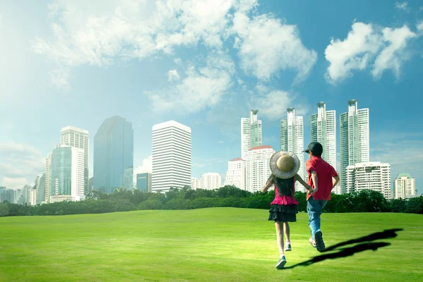 Happy children running in the city park — Stock Photo, Image