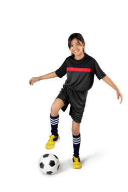 Genç Asyalı kız futbol oynamak