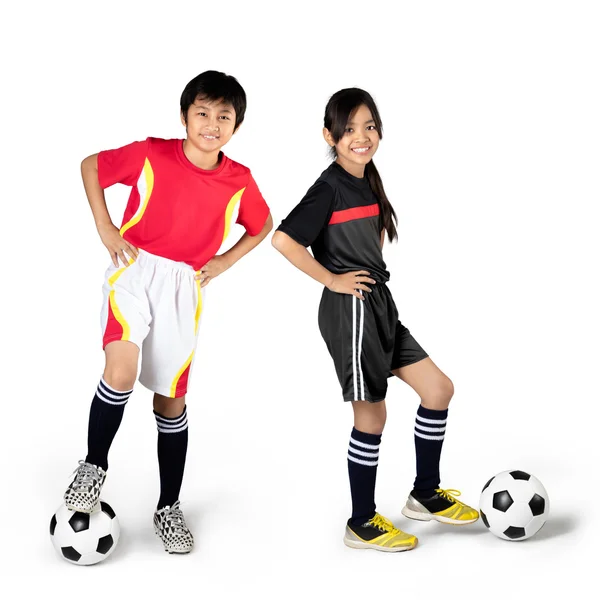 Young asian children playing soccer — Stock Photo, Image