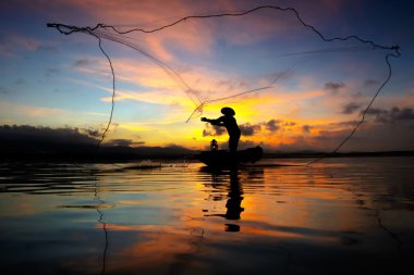 Silhouette of fishermen clipart