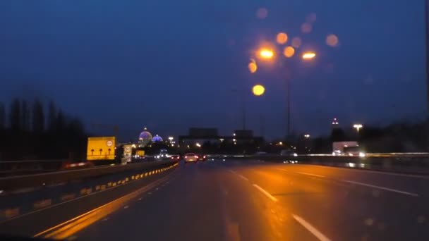 Driving Manchester city ring road M60 by Trafford at night — Stock Video