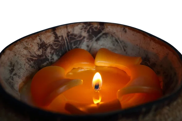 Coconut shell candle on white — Stock Photo, Image