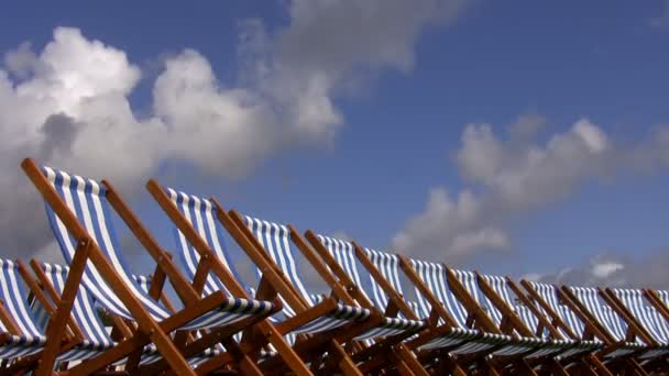 Line of empty folding chairs — Stock Video