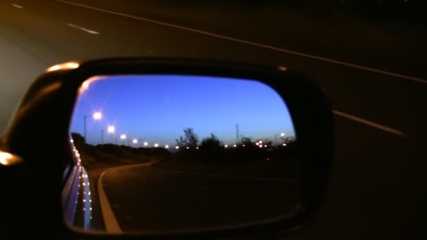 Car mirror view driving at night — Stock Video