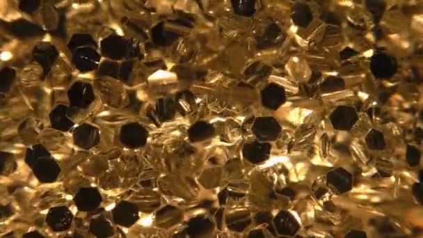 Gyllene glittrande flytande partikel bakgrund — Stockvideo