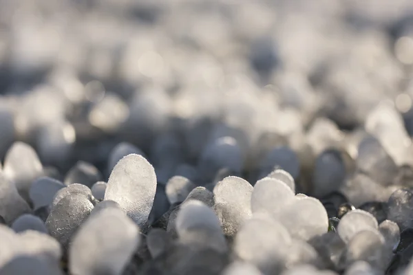 Little round icicles on the ground — Stock Photo, Image