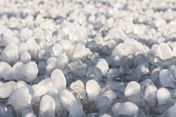 Little round icicles on the ground — Stock Photo, Image