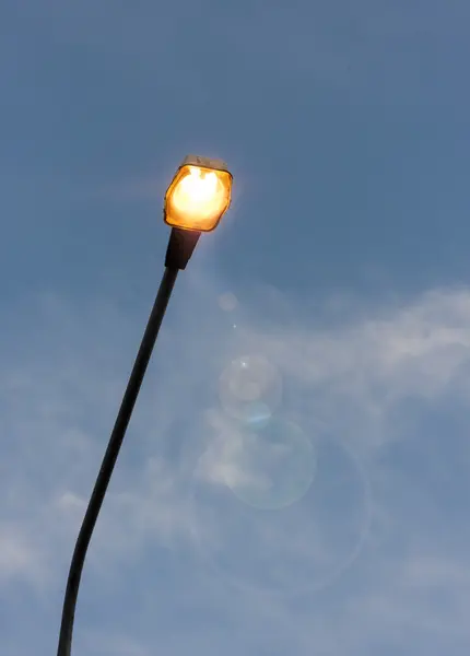 Turned on streetlight in the eveing — Stock Photo, Image