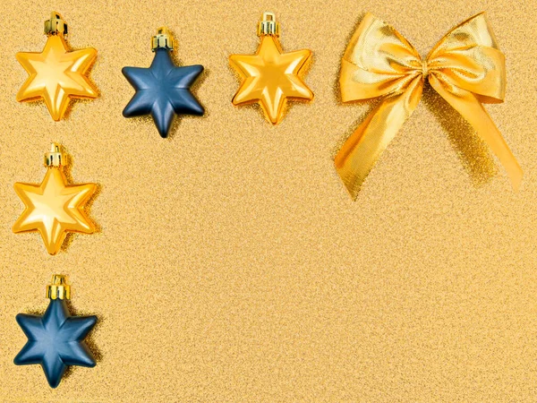 Close Festive Christmas Tree Toys Gold Gray Stars Golden Bow — стоковое фото