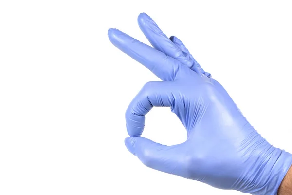 Χέρι Μπλε Γάντι Απομονώνονται Λευκό Δείχνει Σημάδι — Φωτογραφία Αρχείου