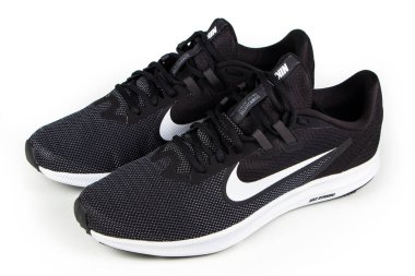 Dnipro. Ukraine. 13 june 2021. Black sneakers running shoes Nike isolated on white background.