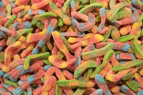Solucanlar Şeklinde Renkli Jöleli Şekerler Şeker Arkaplanı — Stok fotoğraf