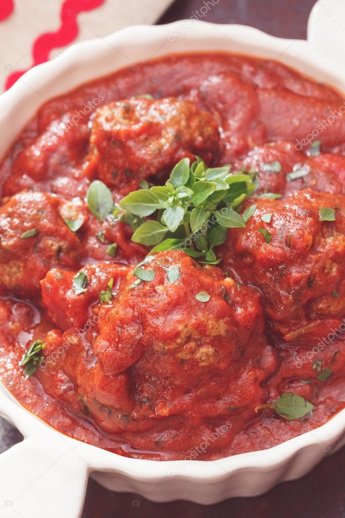 Meatballs in tomato and red wine sauce Stock Photo by ©Slast 104855682
