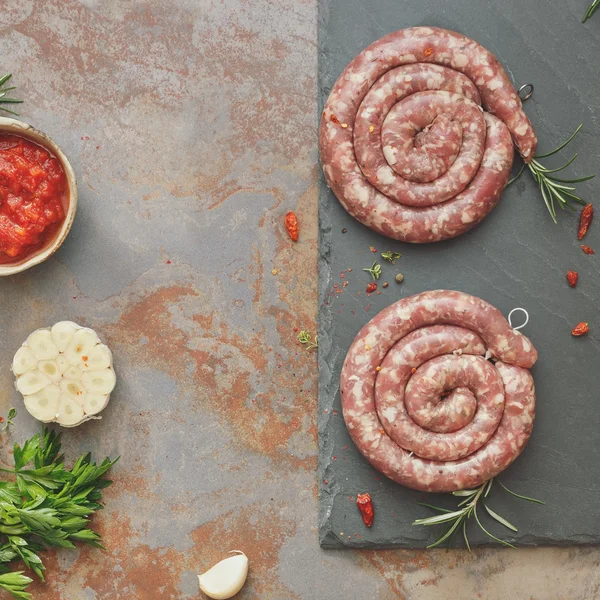 Raw uncooked sausages — Stock Photo, Image