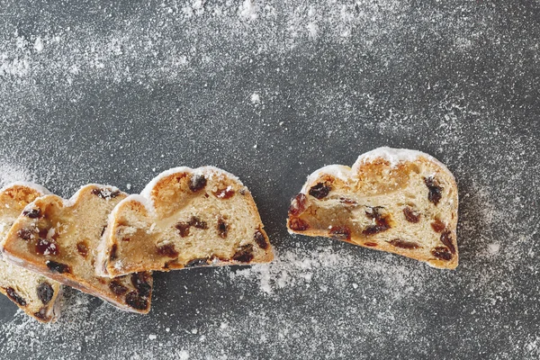 Christmas stollen with icing sugar — Stock Photo, Image
