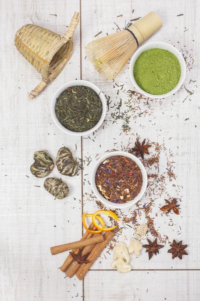 Tea. Three bowls of tea  - powder green tea, red bush tea and green tea — Stock Photo, Image