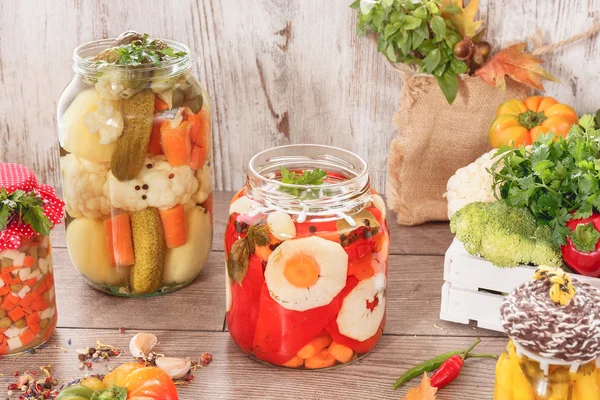 Pickled vegetables. Assorted mixed vegetables in preserving jars — Stock Image Pickled vegetables. Assorted mixed vegetables in preserving jars Royalty Free Stock Images