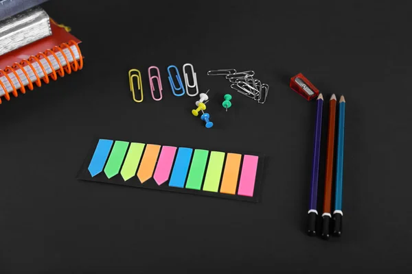 Office Supplies Black Background Paper Clips Buttons Notepads Pencils Study — Stock Photo, Image