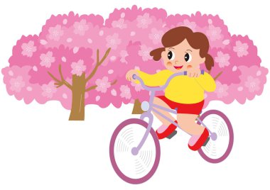 Yanında çiçek açmış kiraz çiçekleriyle bisiklet süren bir kız.