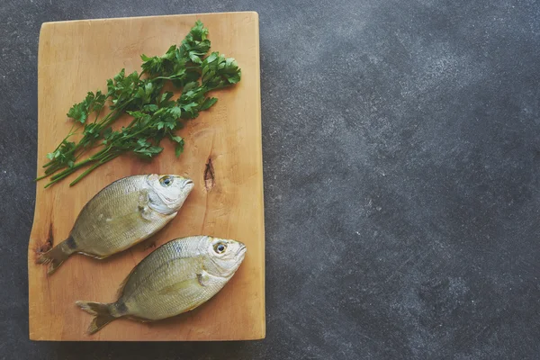 Fresh fishes preparing to be cooked — Stock Photo, Image