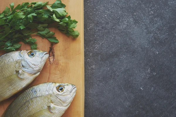 Fresh fishes preparing to be cooked — Stock Photo, Image