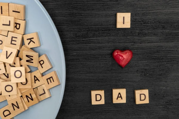 Wooden letters spelling I love dad — Stock Photo, Image