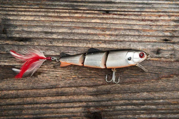 Cebo de pesca aislado sobre fondo de madera —  Fotos de Stock