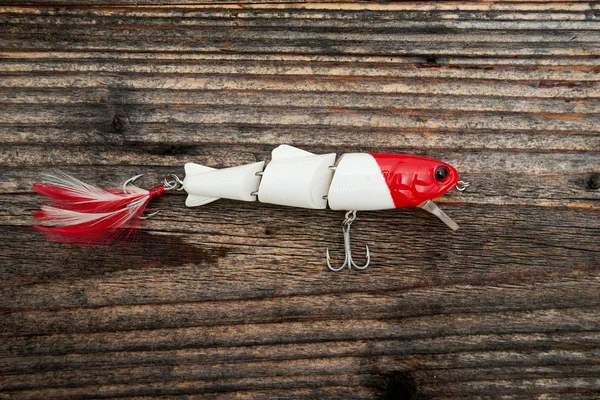 Cebo de pesca aislado sobre fondo de madera —  Fotos de Stock