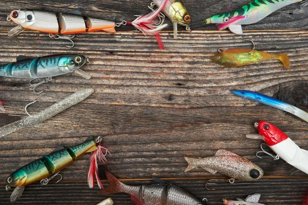 木製の背景に分離された釣り餌 — ストック写真