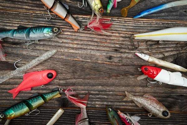 木製の背景に分離された釣り餌 — ストック写真