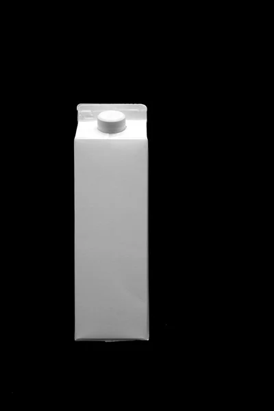 White blank milk box on black background — Stock Photo, Image