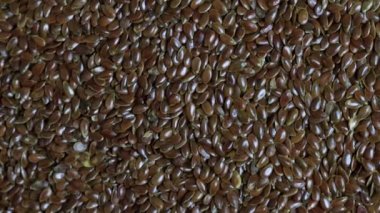 Beyaz arka planda keten tohumu, yakın plan. Tarım, metin için kopyalama alanı, makro