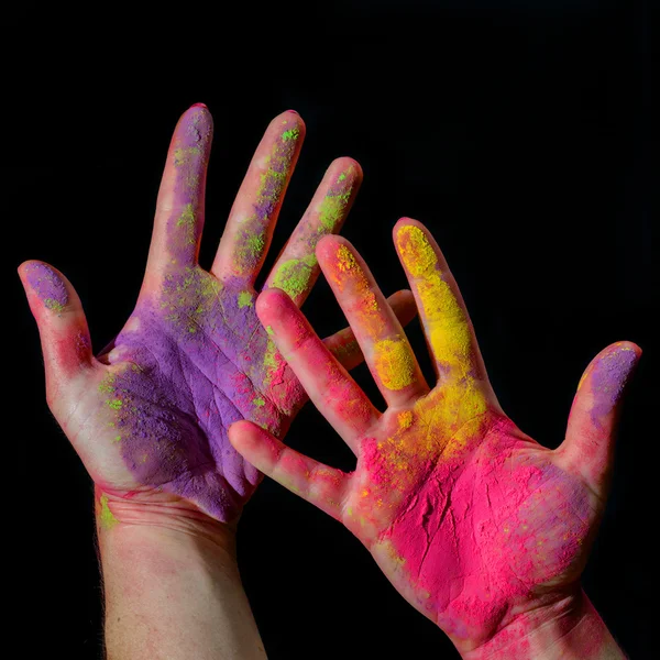 Handen met holi verf — Stockfoto