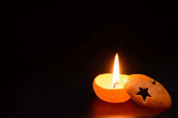 Candle of tangerine — Stock Photo, Image