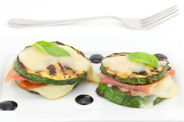 Grilled zucchini stuffed with ham and cheese — Stock Photo, Image