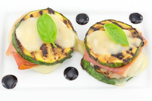 Grilled zucchini stuffed with ham and cheese — Stock Photo, Image