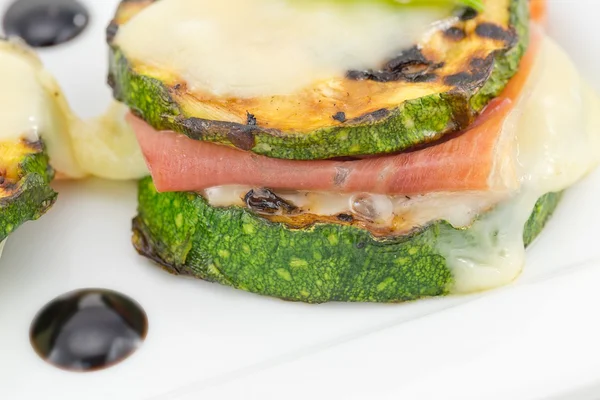 Grilled zucchini stuffed with ham and cheese — Stock Photo, Image