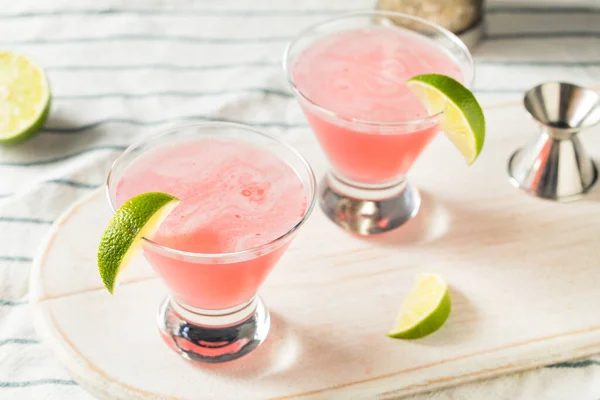 Boozy Refreshing Cranberry Cosmopolitan Cocktail Lime Garnish — 스톡 사진