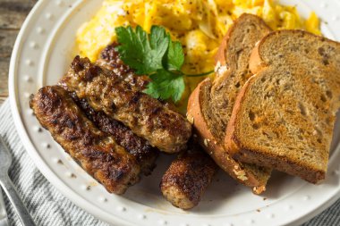 Yağlı Pişmiş Domuz Pastırması Yumurtalı Kahvaltı için Sosis