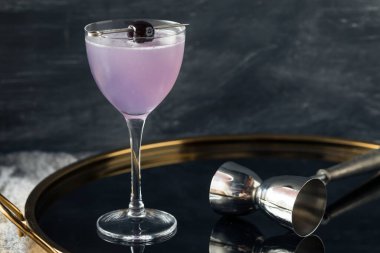 Boozy Refreshing Aviation Cocktail with Gin and Violette Liquor clipart