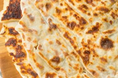 Ev yapımı Norveçli Patates Lefse Şekerli ve Tereyağlı Yassı Ekmek