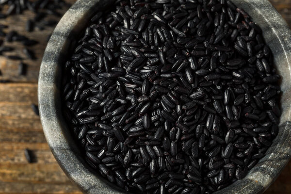 Dry Organic Asian Black Rice in a Bowl
