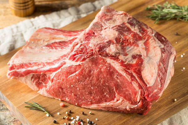 Raw Red Prime Rib Roast with Salt and Pepper