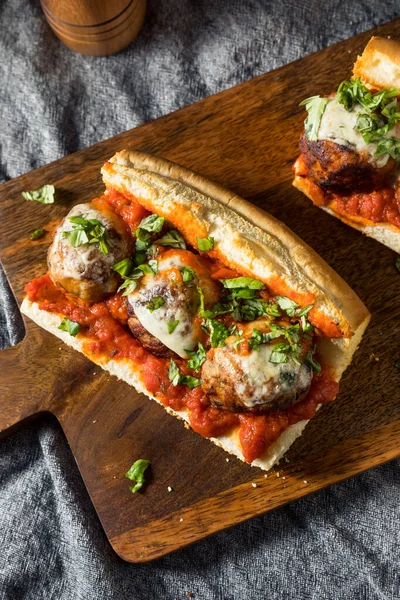 Homemade Cheesy Meatball Sub Sandwich with Marinara and Provolone