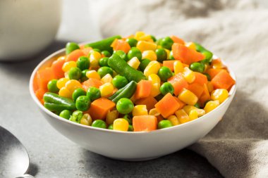 Healthy Steamed Mixed Vegetables with Peas Corns and Carrots