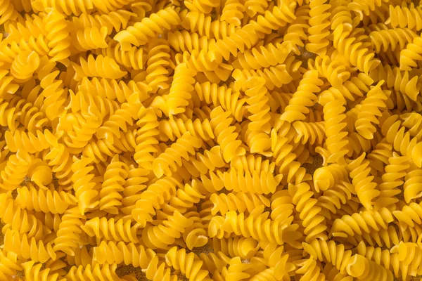 Macarrão Rotini Orgânico Amarelo Seco Uma Tigela — Fotografia de Stock