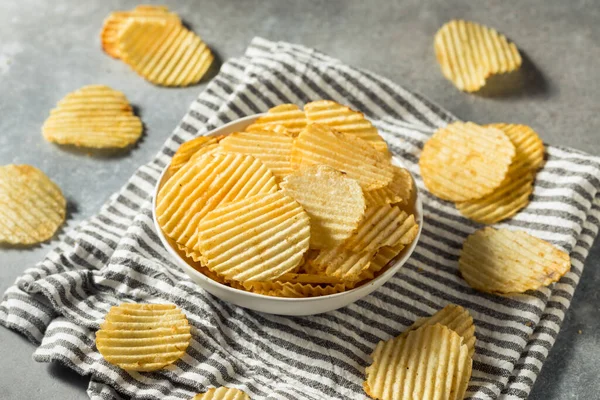 Salty Ruffled Potato Chips in a Bowl