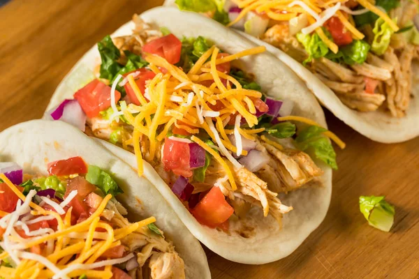 Homemade Shredded Chicken Tacos with Lettuce Cheese Tomatoes