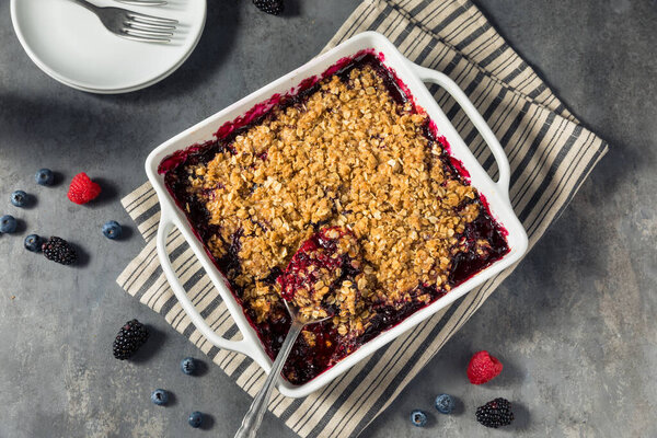 Homemade Berry Crumble Dessert with Blackberry and Oats